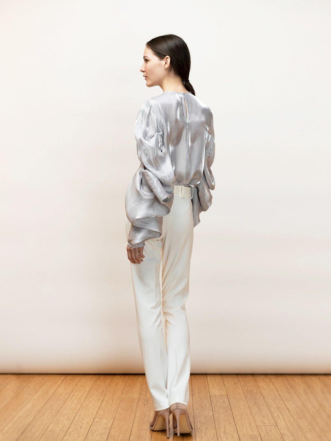 Dramatic silver draped blouse