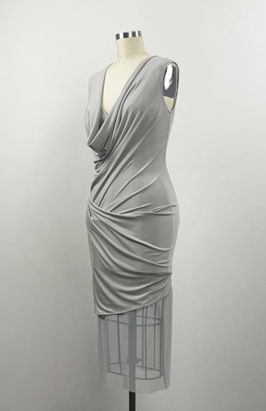  Short, Grecian style, draped, knit dress, in taupe color jersey knit, worn over a sheer, midi, mesh slip