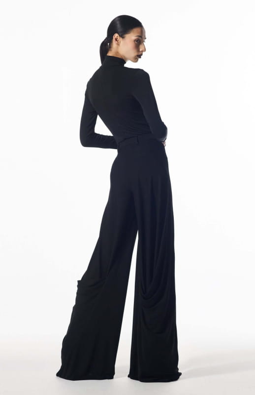 draped pants model wearing Klavdia designer trousers