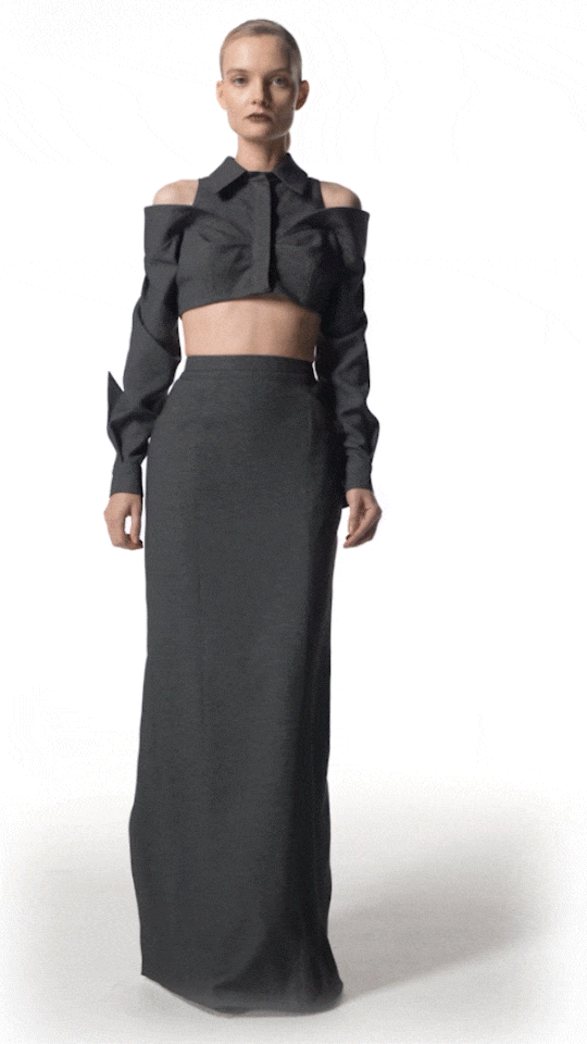 model wearing Kastra crop shirt top with cutout shoulders