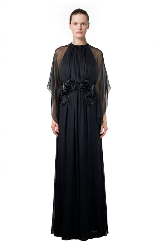 model wearing a long black silk chiffon gown