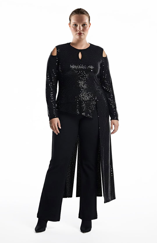 plus size moder wearing black sequin top and pants