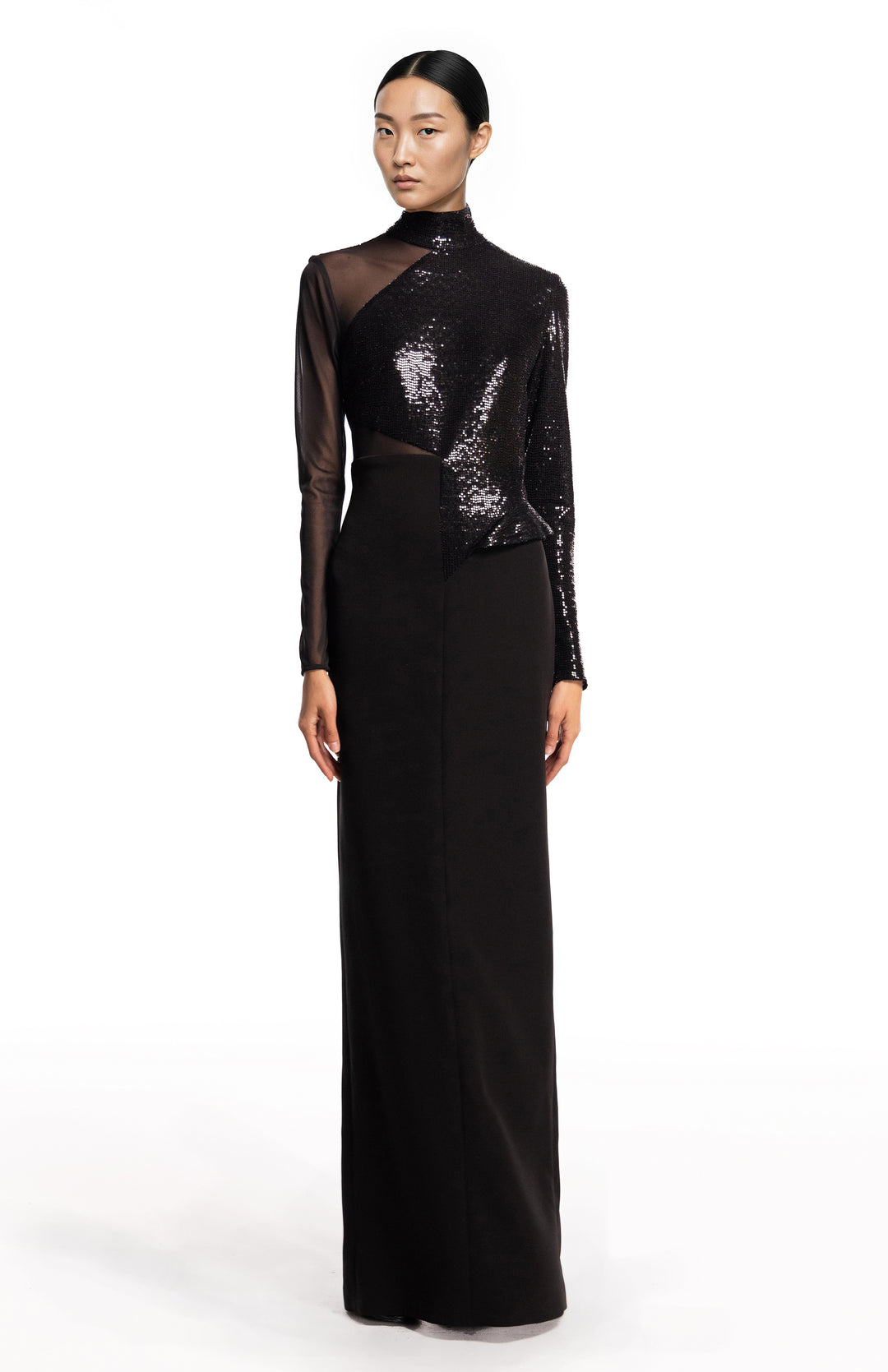 model wearing an elegant long black gown 
