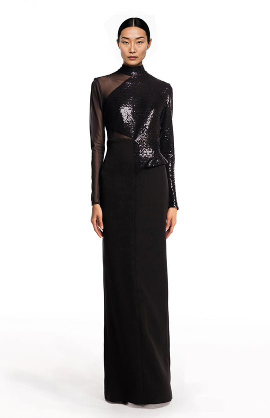 model wearing an elegant long black gown 