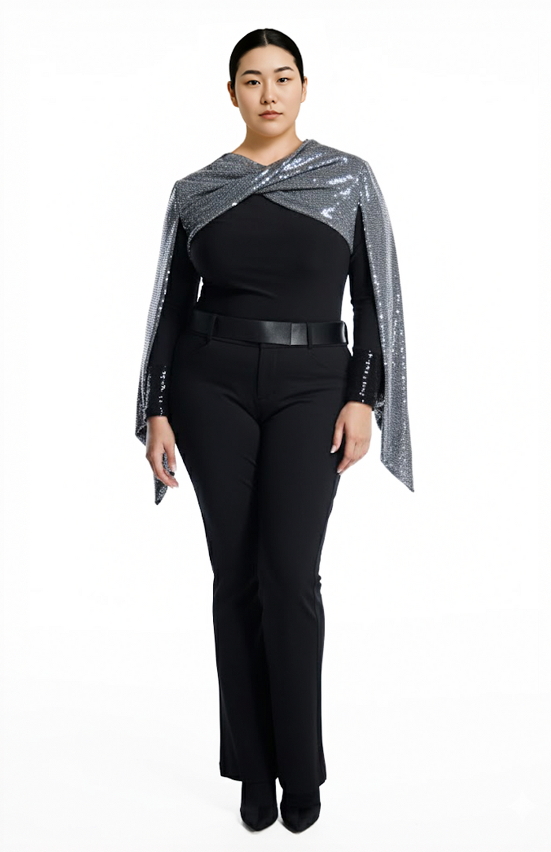 plus size model wearing a draped sequin shrug