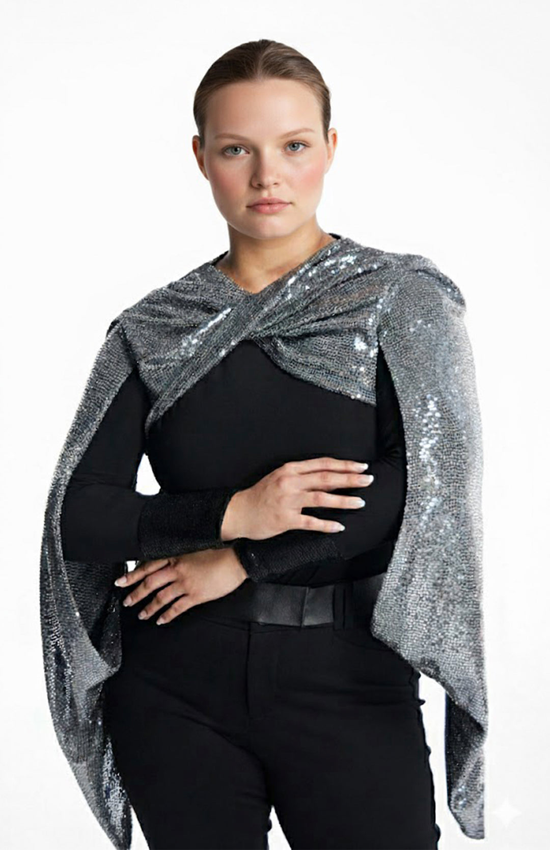 plus size model wearing a draped sequin shrug
