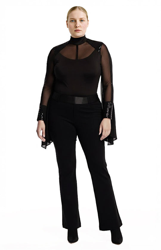 Plus size model is wearing a black draped bodysuit and black pants