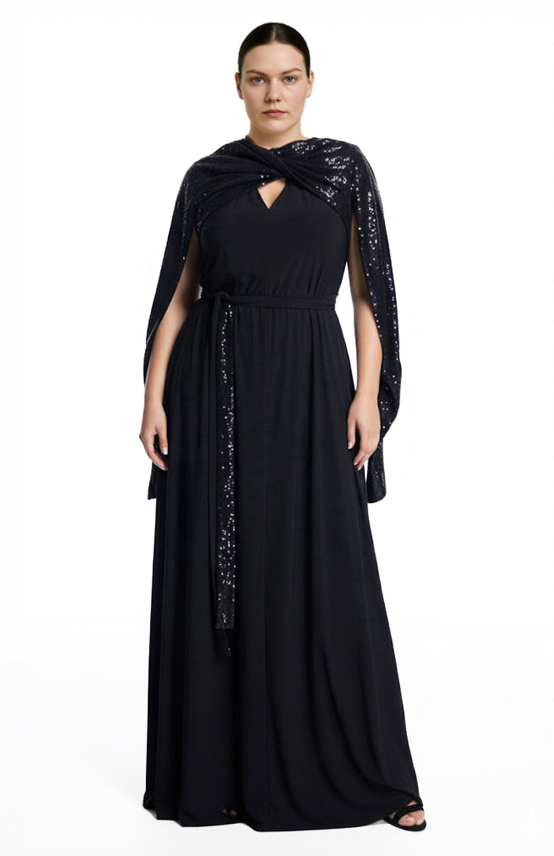 Plus size model is wearing long black gown with sequins