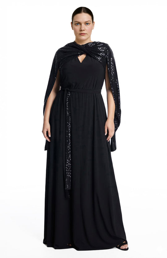 Plus size model is wearing long black gown with sequins