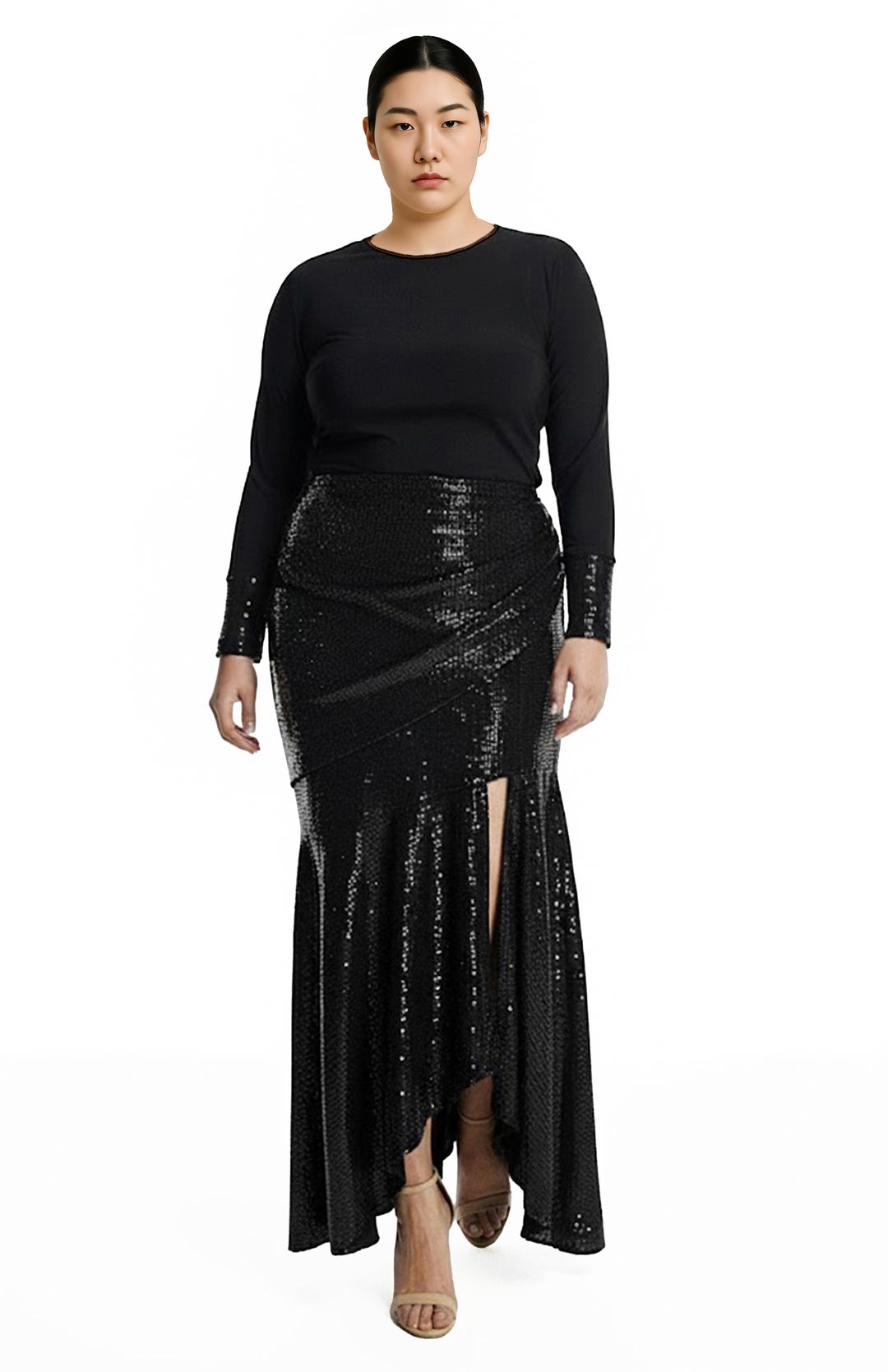 plus size model is wearing black turtleneck top and draped black sequin skirt