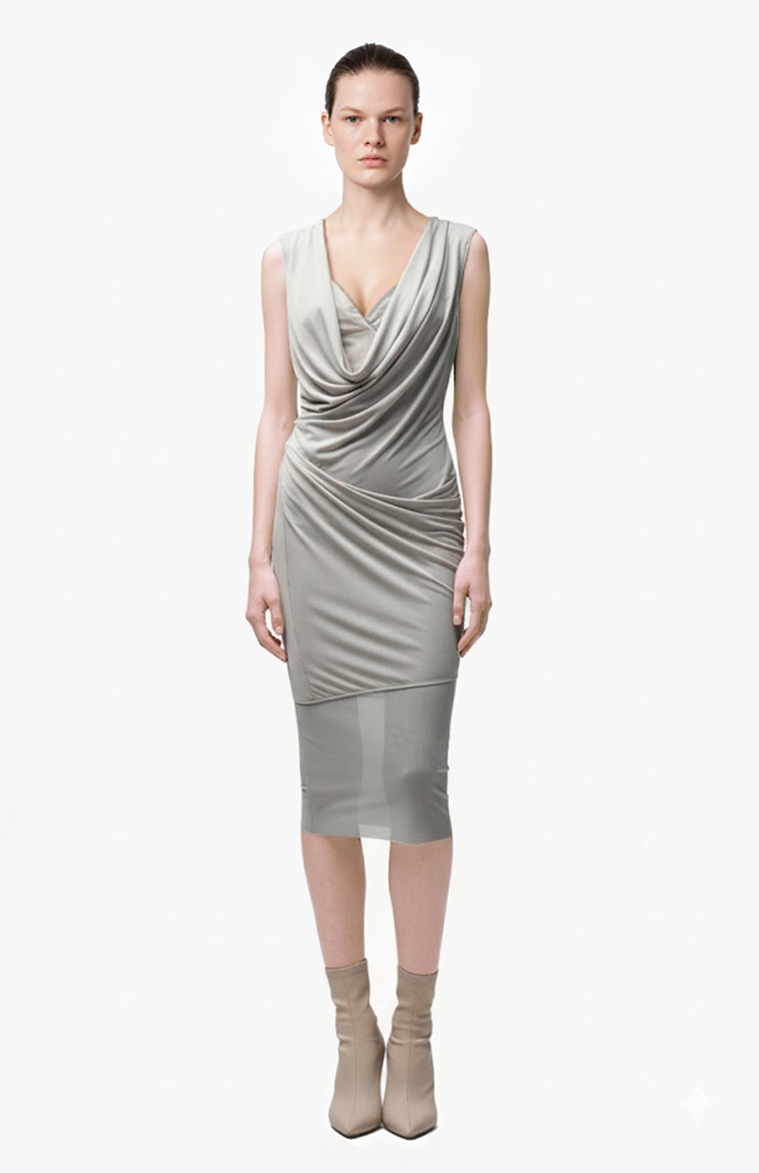 model is wearing beige draped jersey dress
