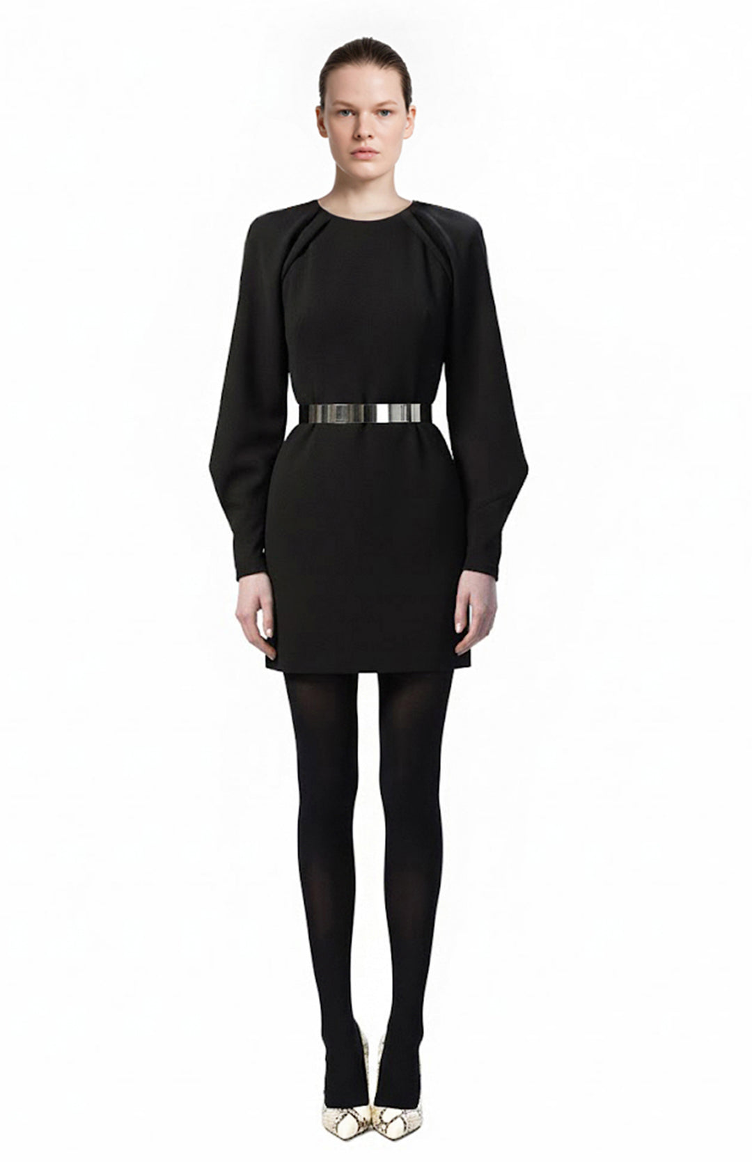 model wearing mini black cocktail dress with open back