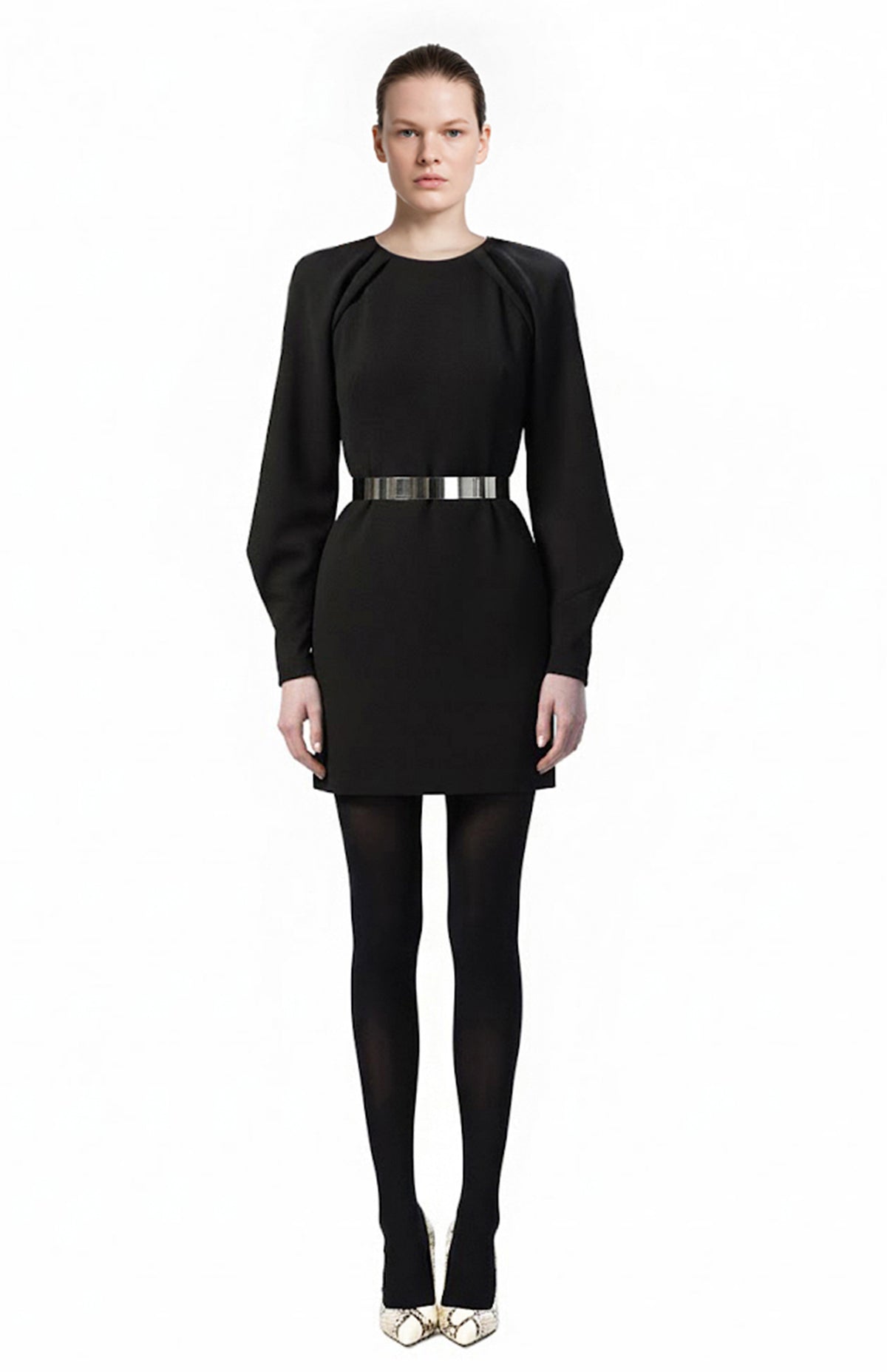 model wearing mini black cocktail dress with open back