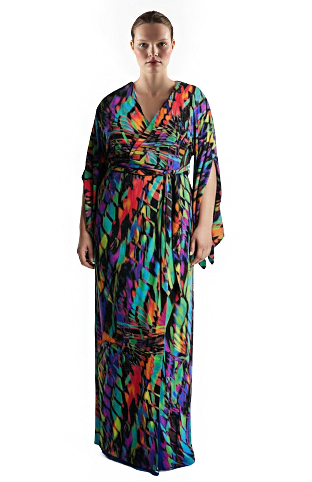 plus size model is wearing a long printed  wrap dress