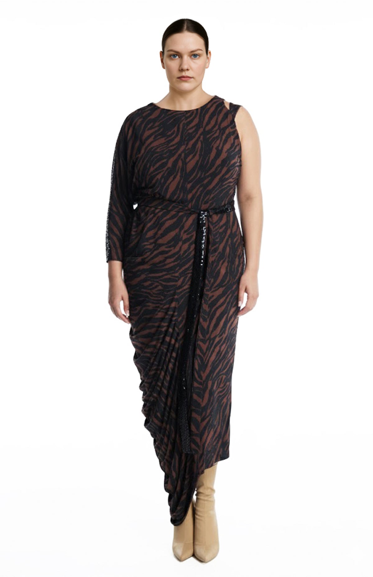 plus size model is wearing an animal print long draped jersey dress
