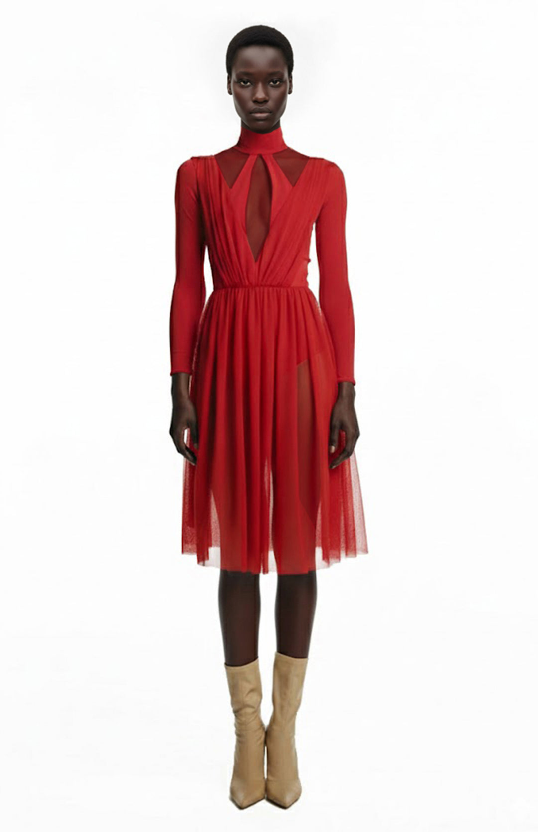 model wearing a red sheer bodysuit dress