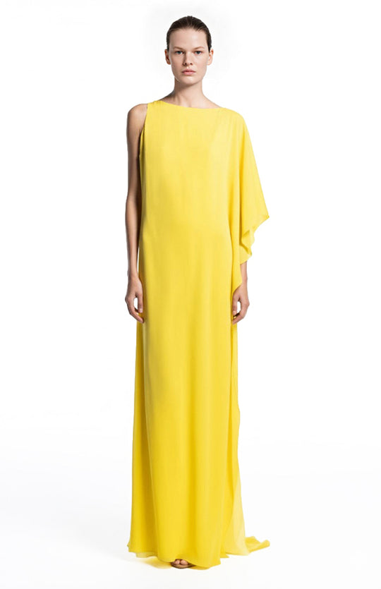 Model is wearin long silk yellow dress