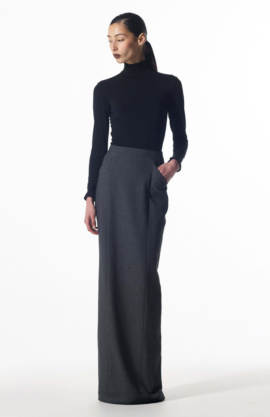 model wearing Philoxene long pencil skirt with black turtleneck top