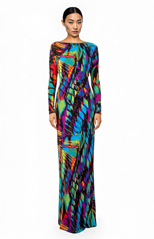 Model is wearing long sleeve, long animal print jersey dress