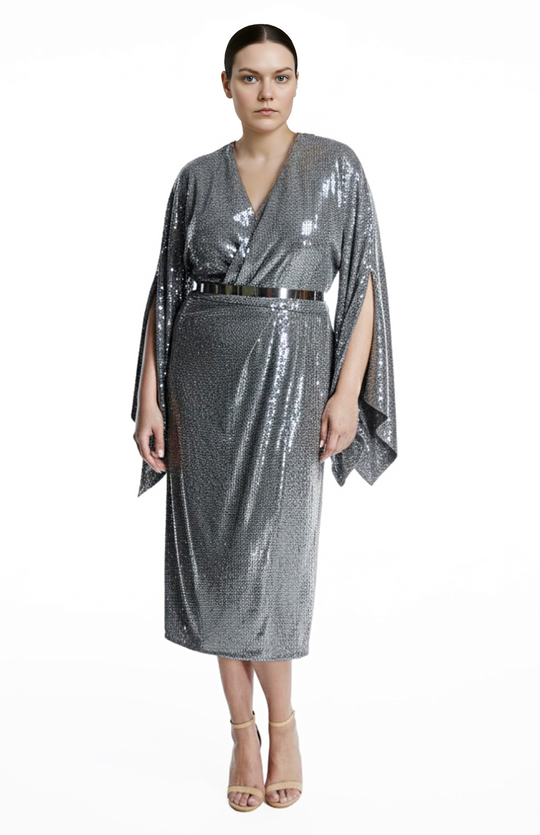 plus size model wearing silver sequin cocktail dress