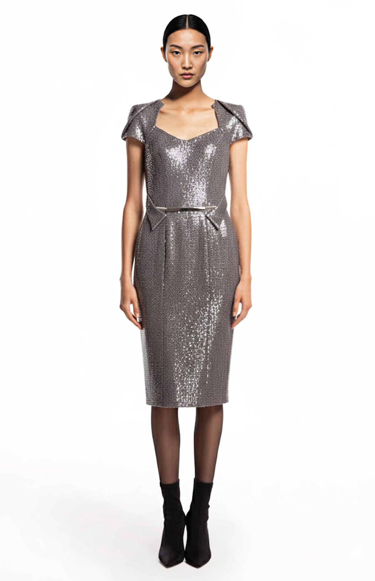 model is wearing midi silver sequin cocktail dress