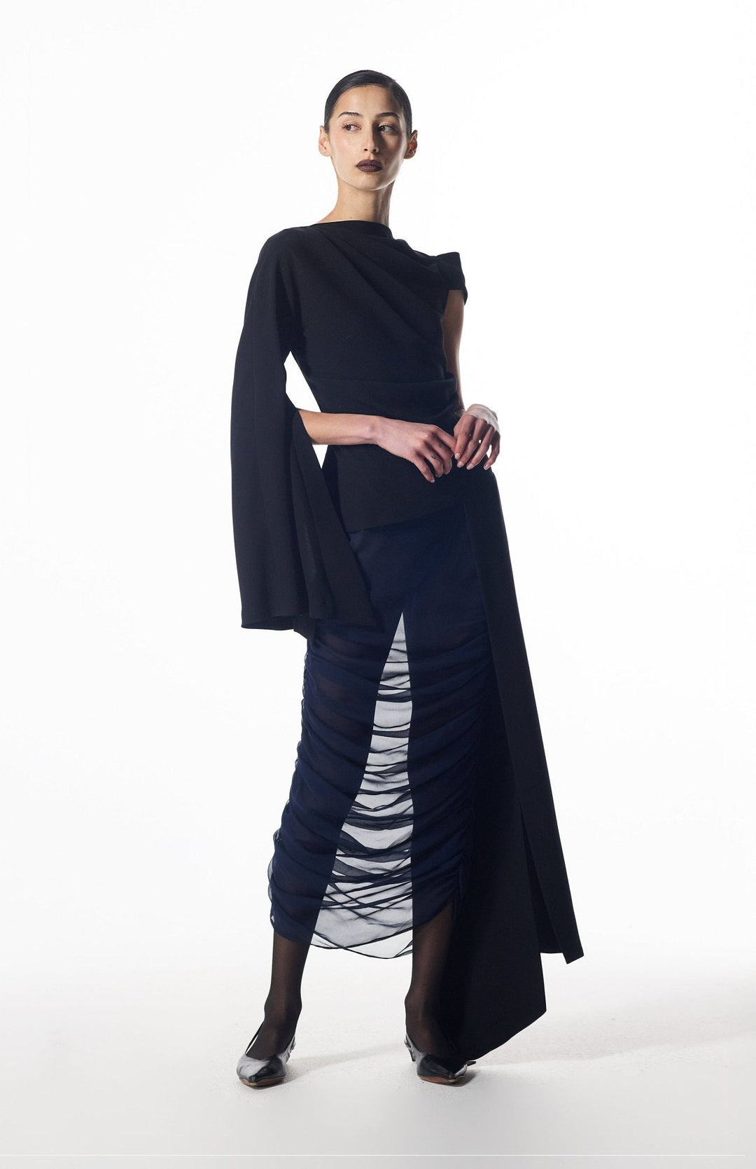 elegant black top and sheer skirt