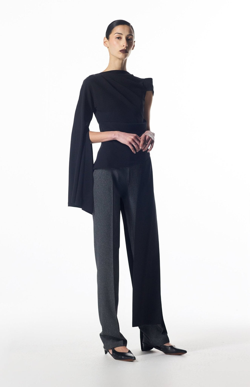 asymmetrical sleeve black top