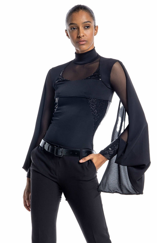 Dramatic,  black designer bodysuit with turtleneck, sheer neckline and sleeves, draped cape, and sequin contrast panels.