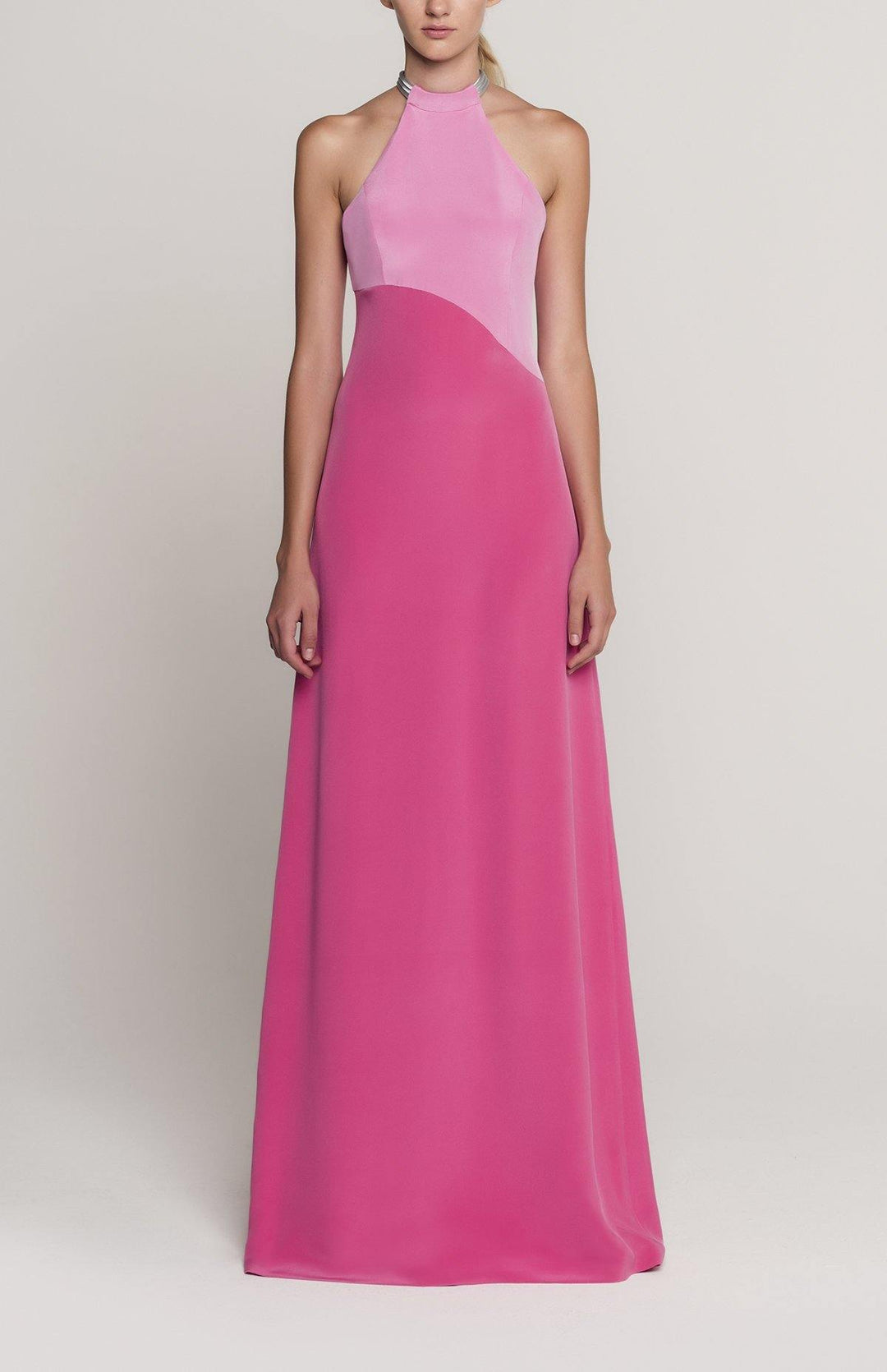 Pale pink and fuschia long, sleeveless, colorblock dress in double silk crepe with a futuristic silver neck trim detail.