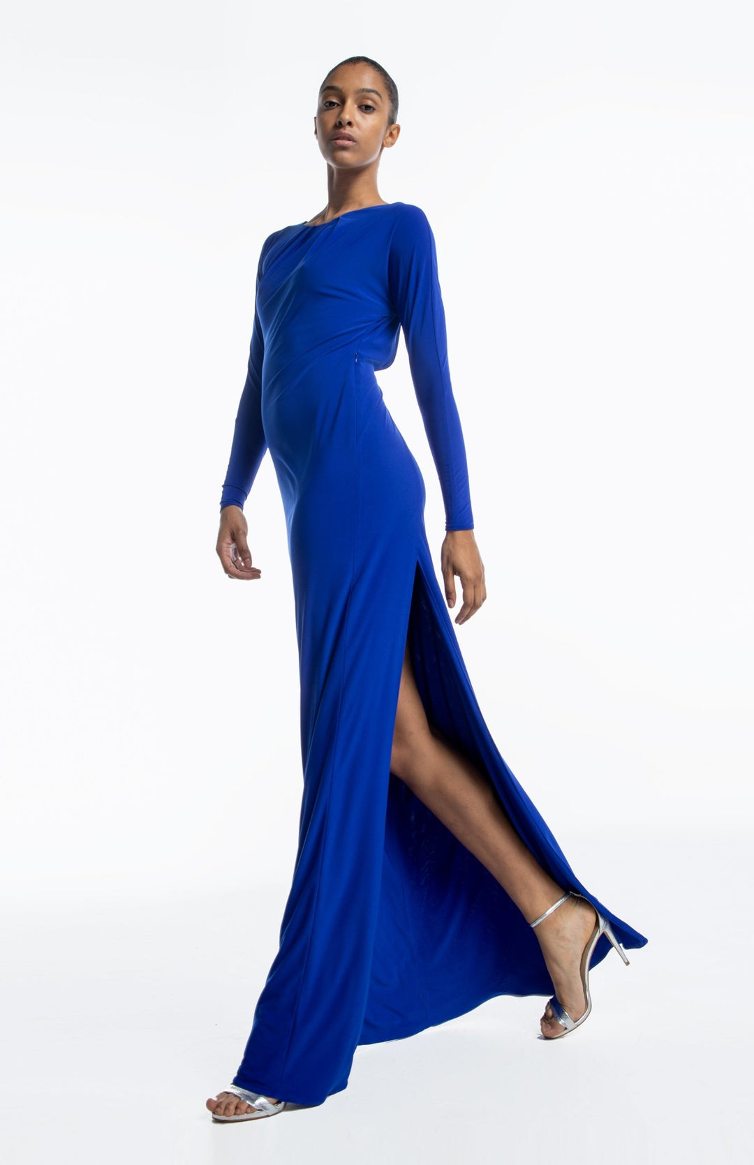 Slim, Grecian style, backless gown, with back cutout detail in royal blue jersey knit