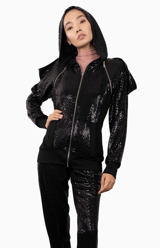 Black, futuristic, sequin hoodie with an oversized, lined hood, decorative zippers and draped shoulders.