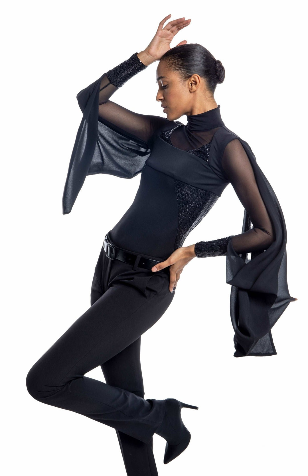 Chic, Black designer bodysuit with turtleneck, sheer neckline and sleeves, draped cape, and sequin contrast panels.