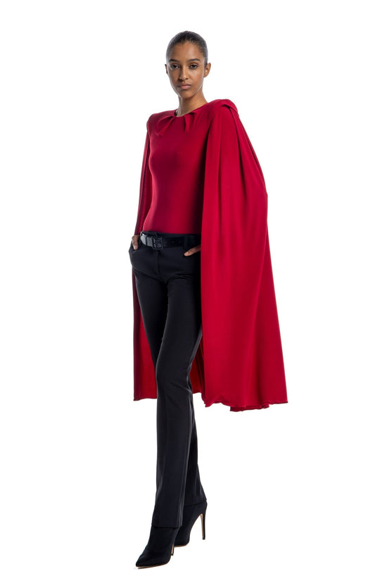 modern, red draped bodysuit with shoulder pads and oversized cape sleeves