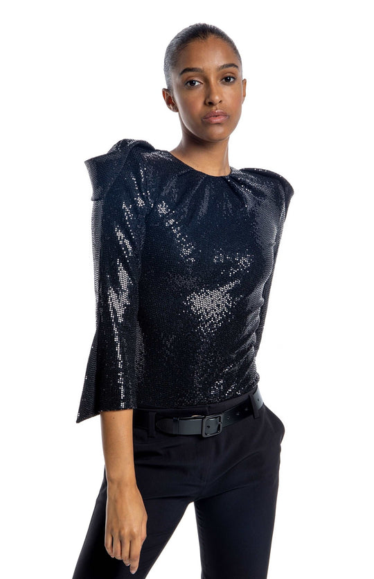 Seductive, black, high shoulder, sequin bodysuit, with draped sleeves, closed neck and high shoulderpads.