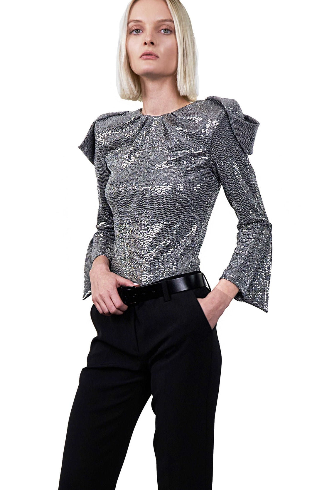 Elegant, silver, high shoulder, sequin bodysuit, with draped sleeves, closed neck and high shoulderpads.