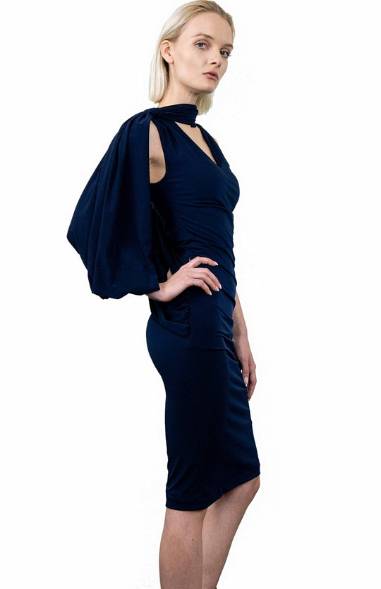 Elegant, Indigo navy, Grecian style, draped dress in jersey knit, with an asymmetrical oversized sleeve.