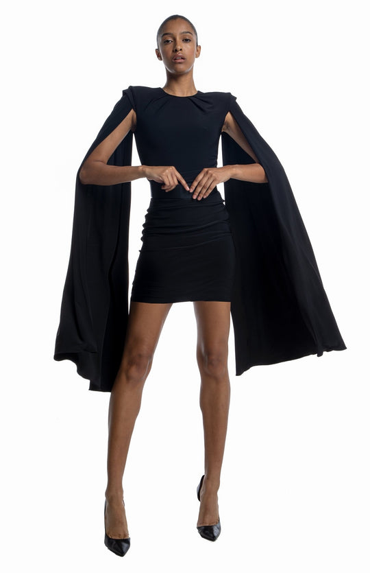 elegant, short, black ,cape sleeve dress in jersey knit with shoulder pads and pleated detail.