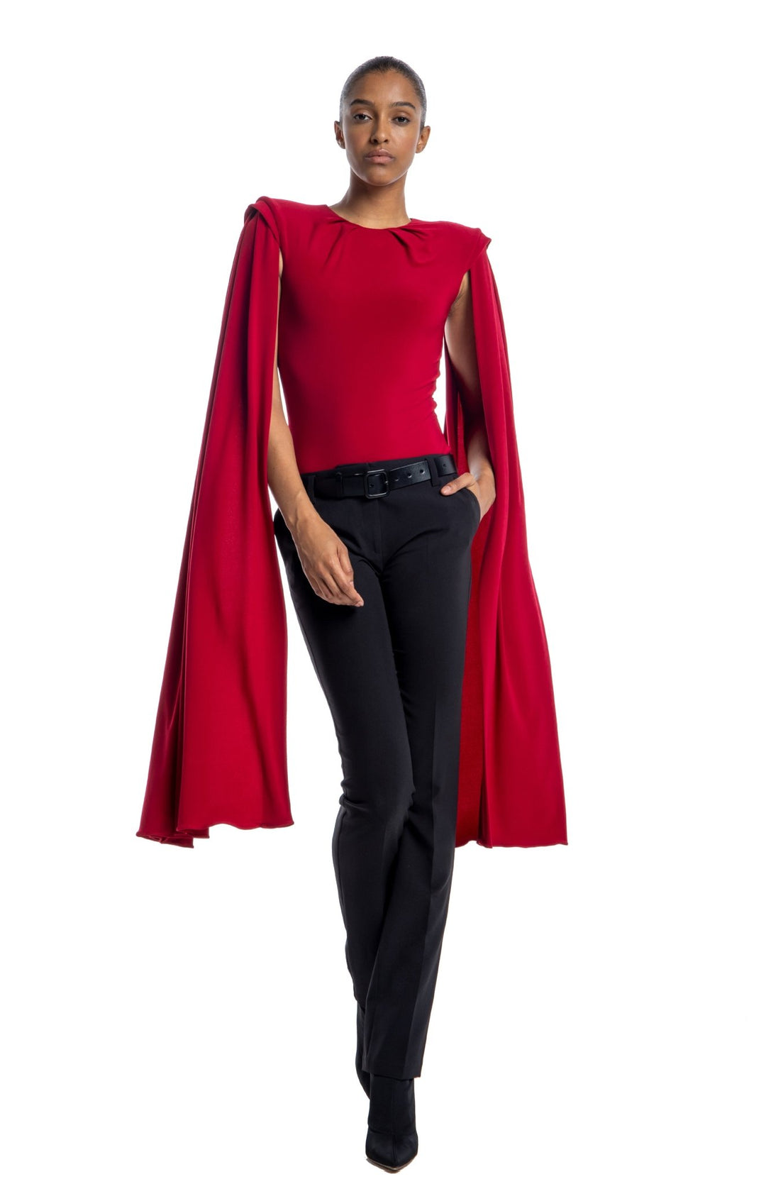 elegant, red draped bodysuit with shoulder pads and oversized cape sleeves