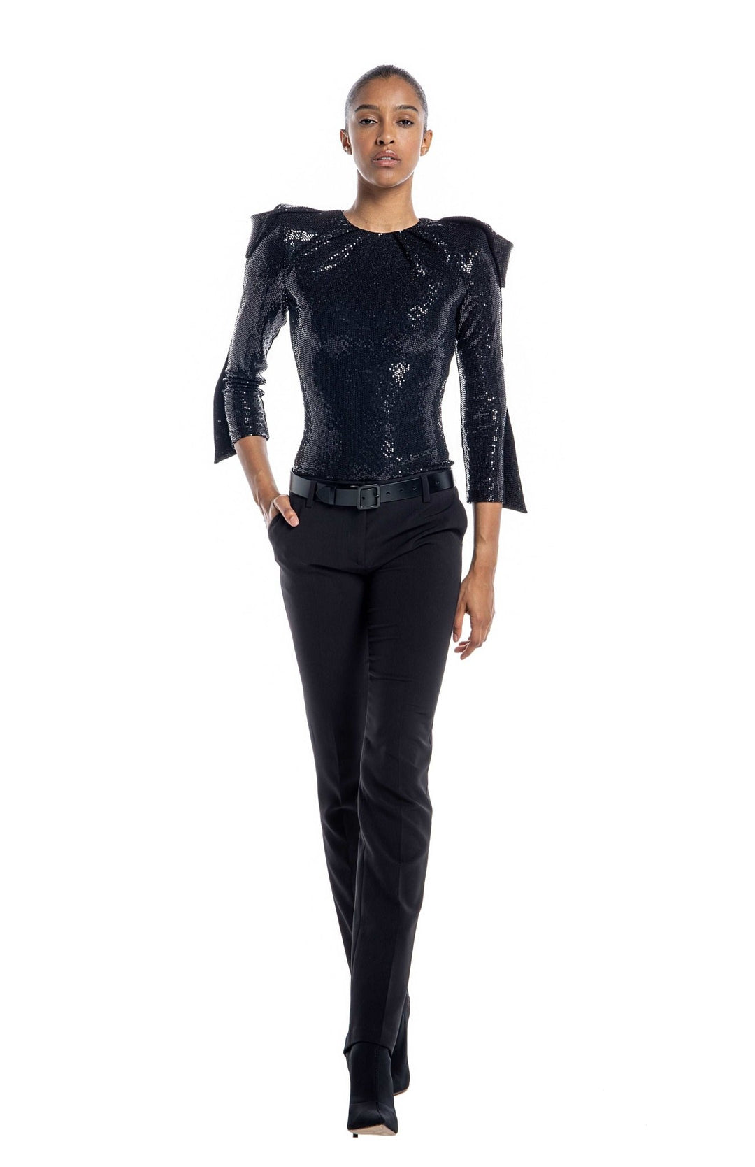 Chic, black, high shoulder, sequin bodysuit, with draped sleeves, closed neck and high shoulderpads.