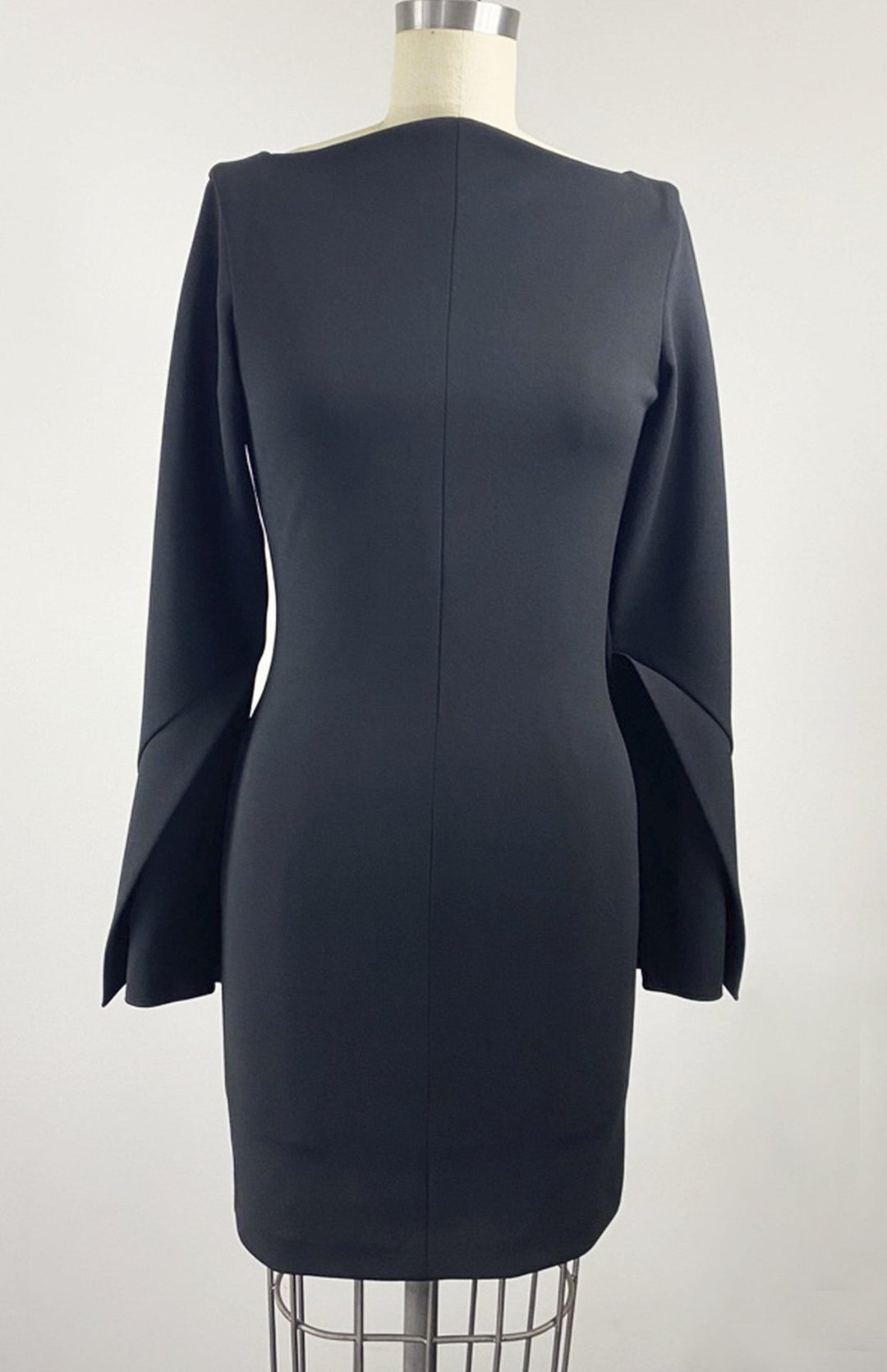Perfect little black dress. Long sleeve short fitted dress, with high neck, long sleeves, made in stretch crepe.